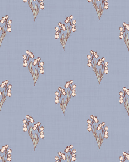 Foraged Bloom Dusty Blue wallpaper with small hand-drawn pink floral bouquets on a soft blue textured background.