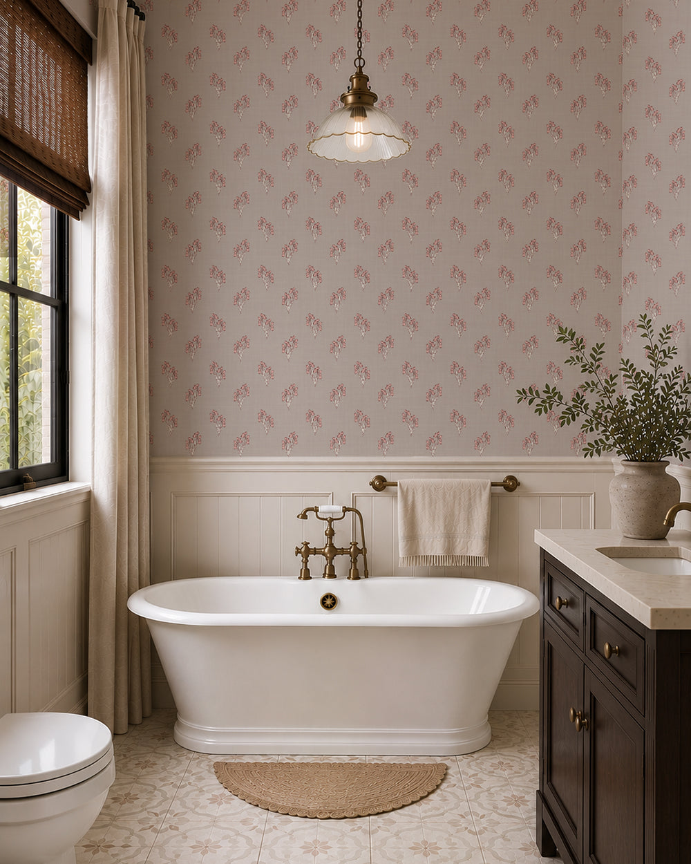 Foraged Bloom Warm Brown wallpaper in an elegant bathroom with a freestanding tub, dark vanity and white paneling.